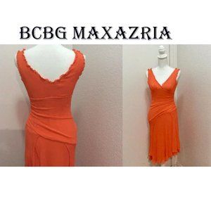 BCBGMAXAZRIA Dress is Ruffled with V neck, side zipper closure midi line…